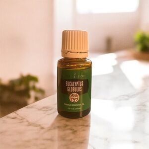 Young Living Eucalyptus Globulus Essential Oil in Brown and Cream